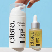 Elara Whitening Facewash and Vitamin-C Serum bottles on a light blue background