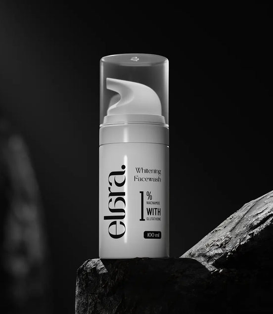 Elara whitening facewash bottle on a dark background