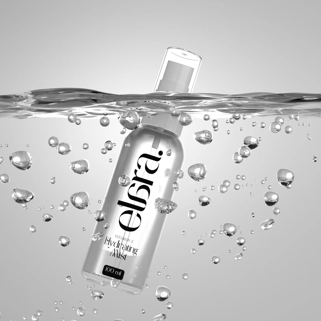 Elara mist bottle with water droplets on a gray background